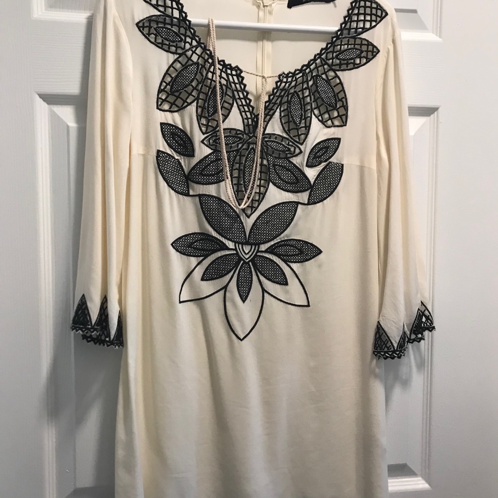 Women's cream-colored blouse/tunic with black embroidery